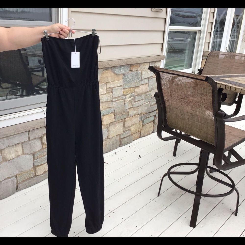 Black sleeveless jumpsuit